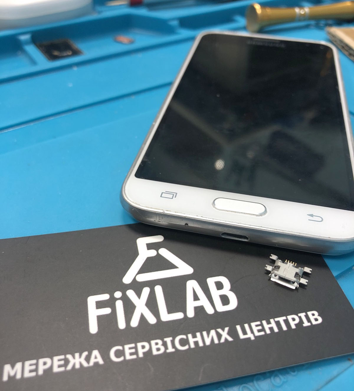 заміна порта зарядки в телефоні ціна Київ